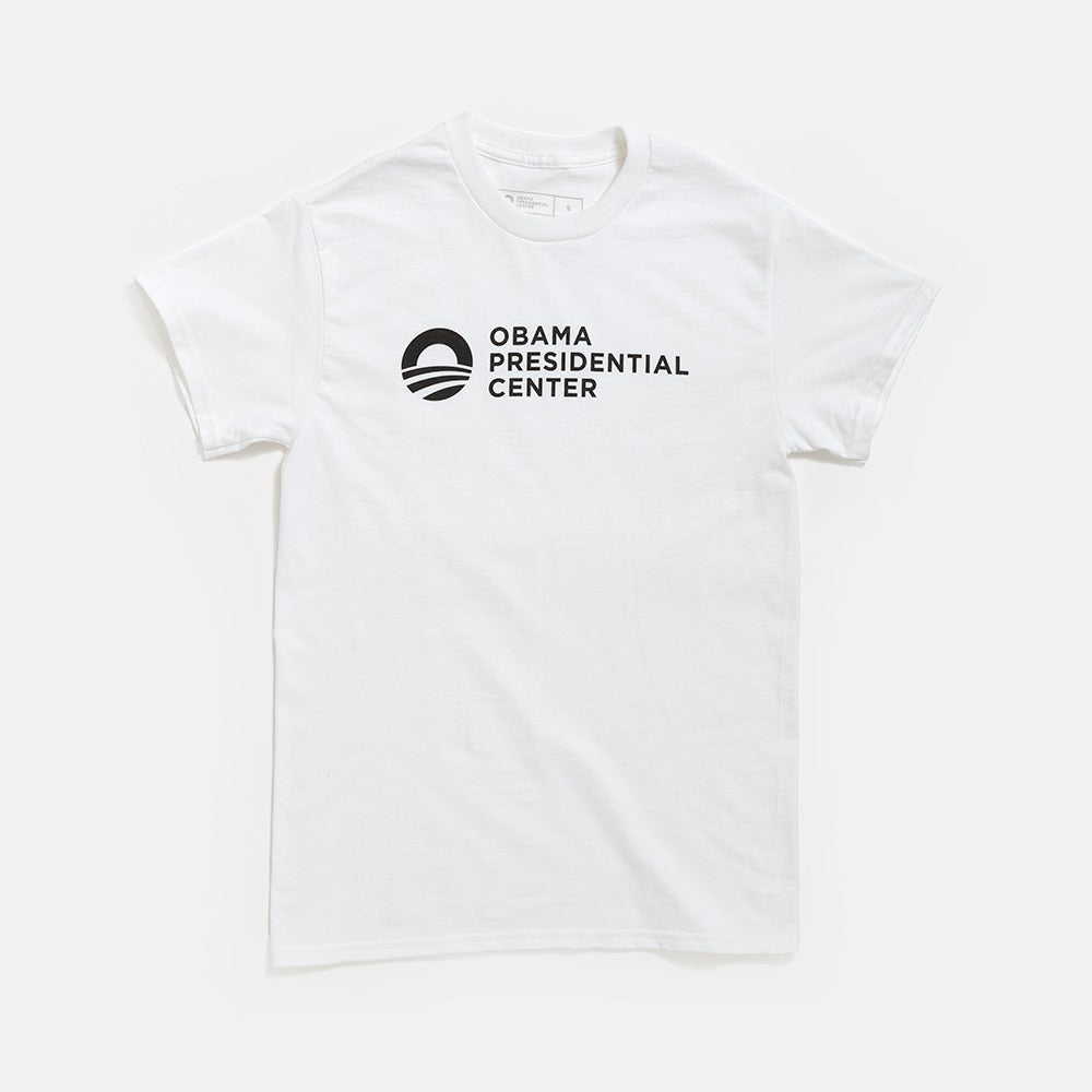 Support the Obama Foundation’s mission with this Obama Presidential Center Logo T-shirt, featuring the logo and text in black on the front. Inspired by Chicago’s South Side, it’s a classic tribute to hope and progress.