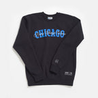 The Obama Presidential Center Chicago Script Sweatshirt is black, with bold blue CHICAGO and white "Bring Change Home" script on the chest, plus a small 44 and text patch near the hem. Laid flat for display.