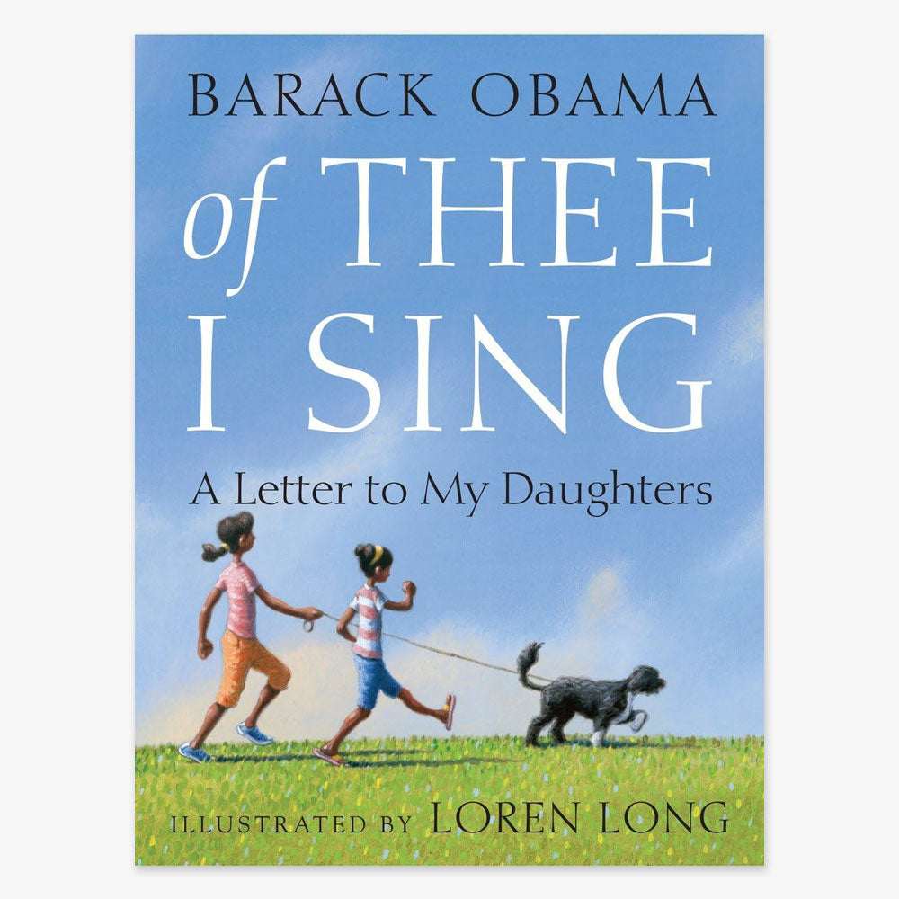 Book cover for Of Thee I Sing: A Letter To My Daughters, featuring two girls and a black dog running on grass under a blue sky. This inspirational children's picture book is written by Barack Obama and illustrated by Loren Long.