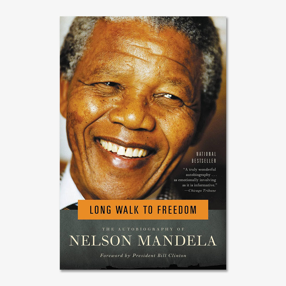 Book cover of Long Walk to Freedom: The Autobiography of Nelson Mandela, showing a close-up photo of Mandela smiling, with the title and author’s name displayed on the image.