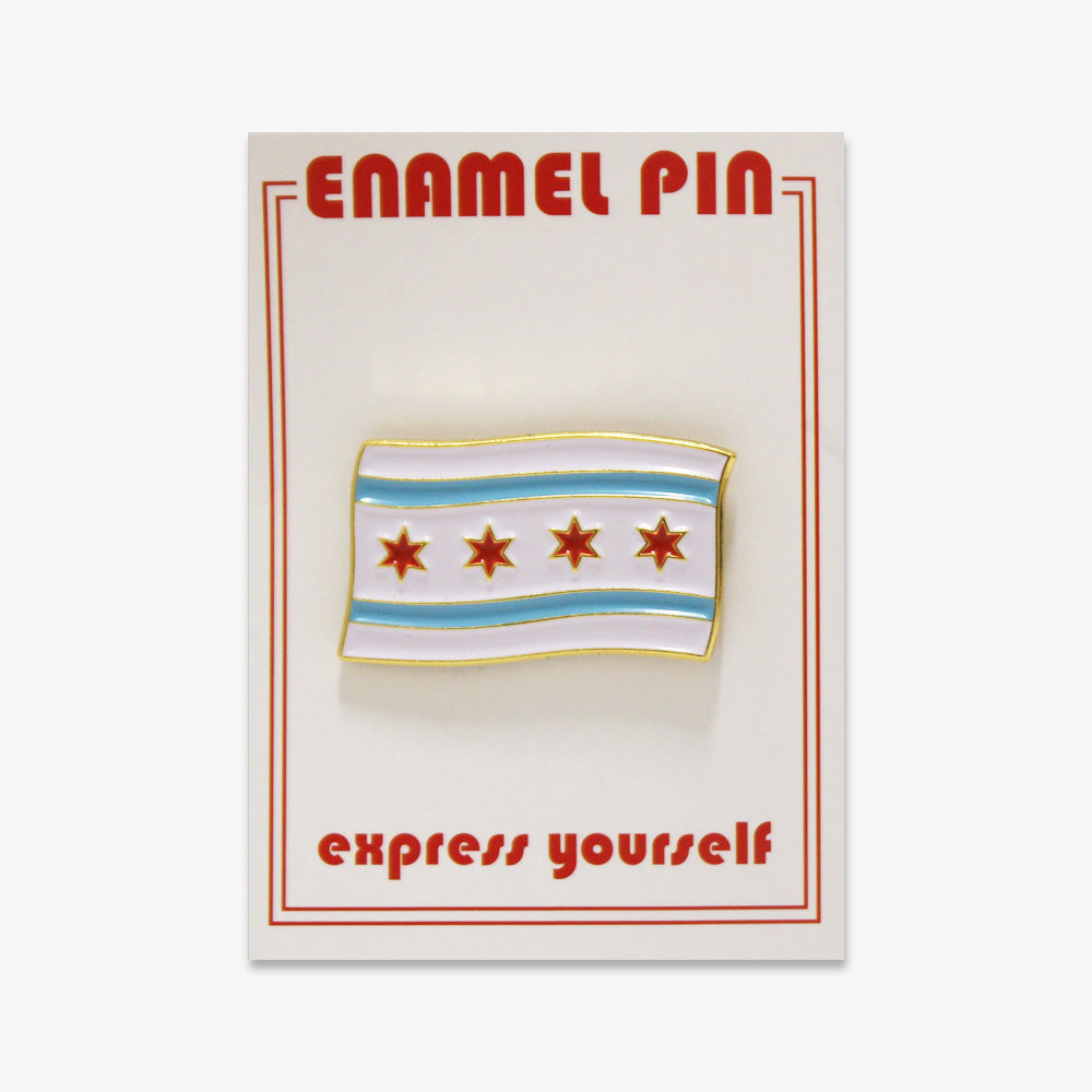 Chicago Flag Pin—enamel pin with four red stars and blue stripes on white, mounted on a card reading “ENAMEL PIN” (top) and “express yourself” (bottom)—ideal for Obama Foundation supporters.