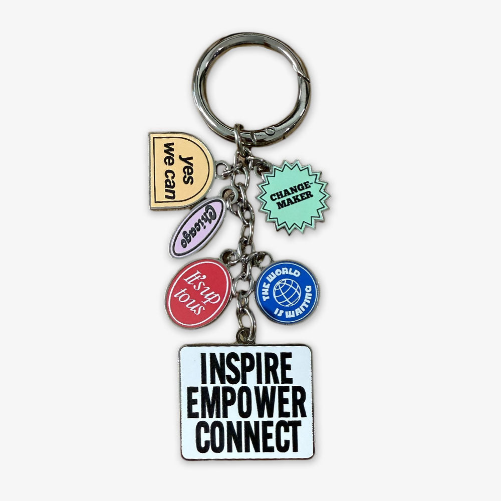 The Obama Presidential Center Stickers Dangle Keychain features six colorful charms with phrases like “yes we can,” “change maker,” and a tag reading “INSPIRE EMPOWER CONNECT”—a fun way to celebrate civic engagement.