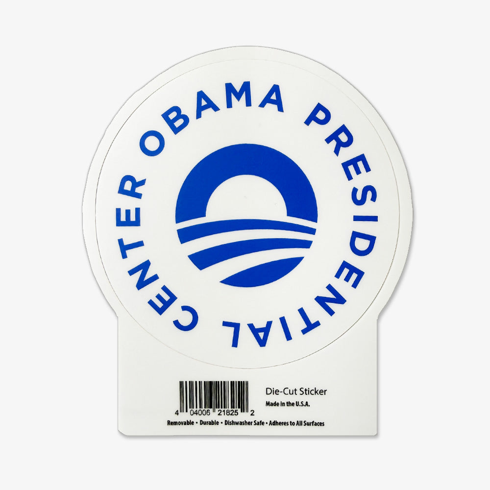 The Obama Presidential Center Sticker is a round white sticker featuring the blue center logo, with "OBAMA PRESIDENTIAL CENTER" in blue around it. A barcode and brief Obama Foundation description are printed at the bottom.