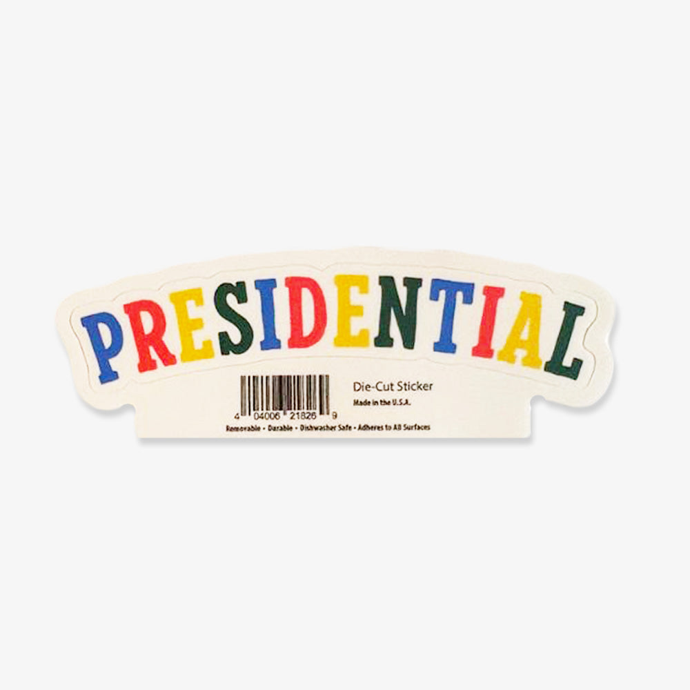 A vibrant Presidential Sticker with the word PRESIDENTIAL in bold, colorful uppercase letters. Below, a barcode and product details appear on a white background—ideal for supporters of the Obama Foundation or Obama Presidential Center.