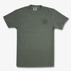 The Obama Presidential Center Hope to Action T-shirt is a gray short-sleeve tee with a small circular logo and "Obama Presidential Center" around a stylized “O” on the upper left chest, shown laid flat on a white background.