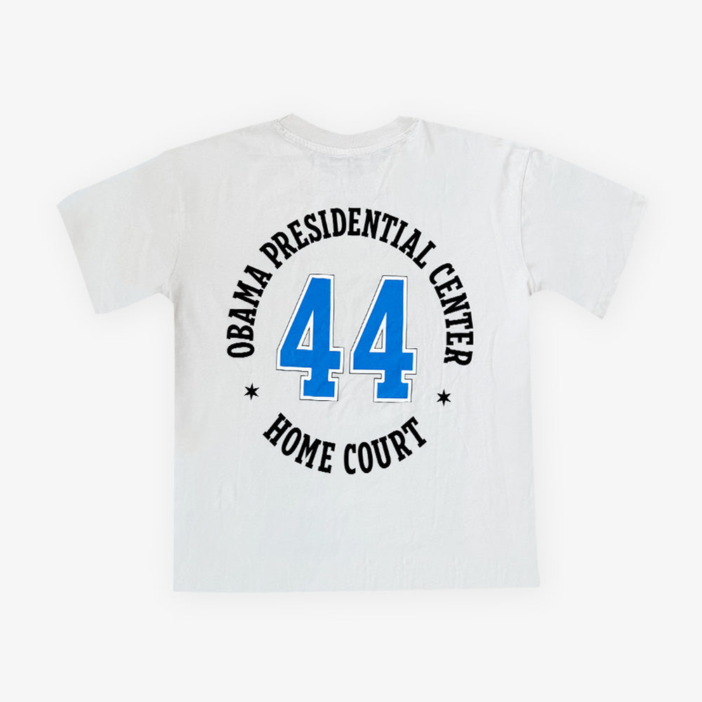 Show your support with the Obama Presidential Center Home Court T-shirt, featuring a bold blue 44 on the back, circled by black text that reads "Obama Presidential Center Home Court," inspired by the Obama Foundation’s spirit.
