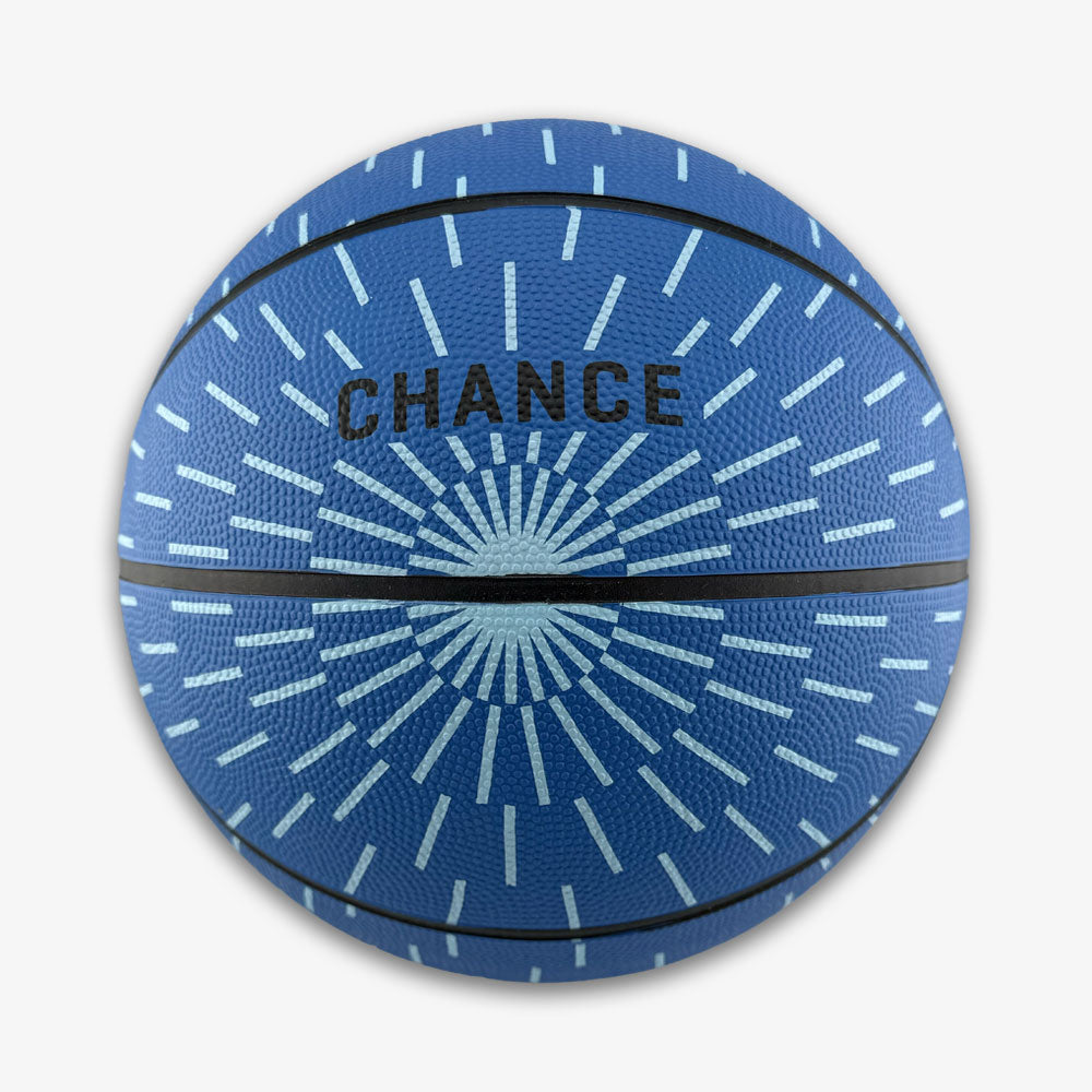 Introducing the Obama Presidential Center Blue Basketball—a kids-size basketball from the Home Court collection, featuring a vibrant blue color accented with white radial lines and “CHANCE” printed in bold black at the top center. This unique basketball is perfect for young athletes or as a memorable keepsake inspired by the Obama Presidential Center.