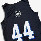 The Obama Presidential Center Home Court Youth Jersey is a black sleeveless jersey with "44" in bold white and blue print and a circular "Obama Presidential Center" logo above the number.