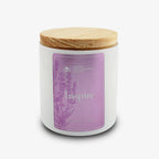 The Inspire Sprig Candle 9 oz. is a hand-poured lavender candle in a white jar with a light wooden lid, featuring a lavender label with the Obama Presidential Center and an elegant lavender plant illustration.