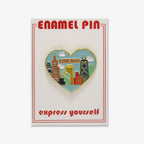 Skyline Heart Pin with vibrant Chicago buildings and clouds, displayed on a card labeled “ENAMEL PIN” and “express yourself” in red—a perfect keepsake for fans of the Obama Foundation and Chicago.
