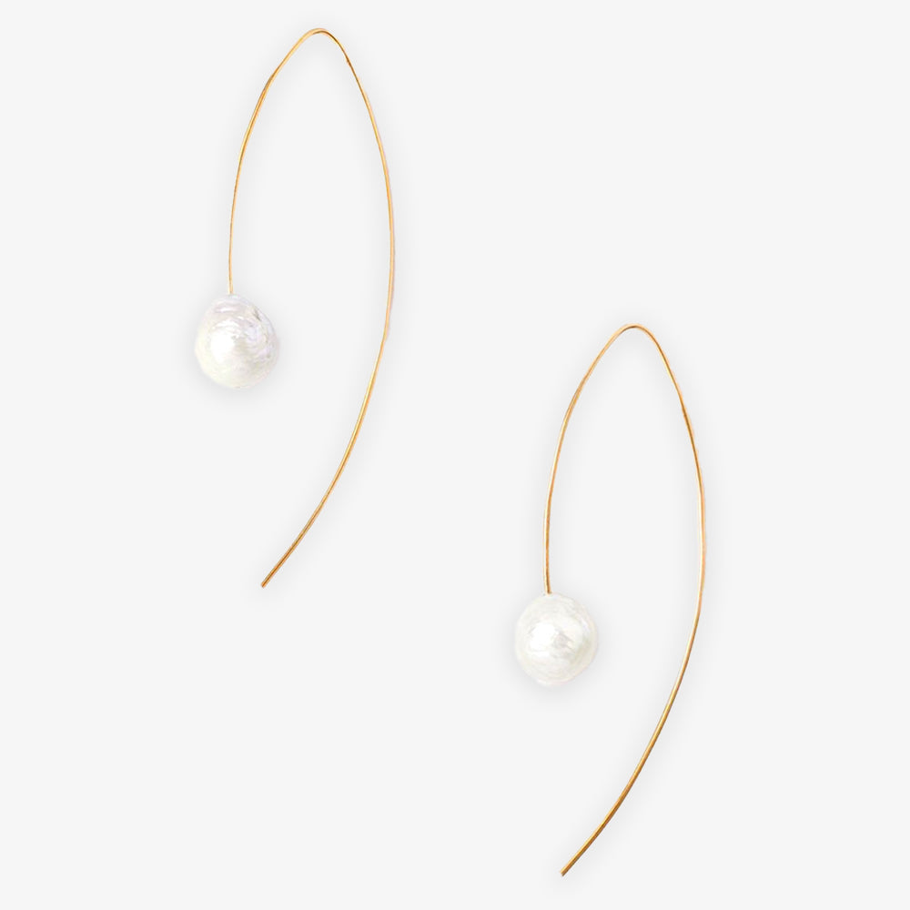 The Michelle Pearl Earrings Gold feature thin, curved gold wires with irregular freshwater pearls on the ends, creating classic, sustainable artisan jewelry inspired by Mrs. Obama’s timeless style. Displayed on a plain white background.