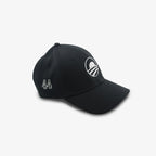The Obama Presidential Center New Era Symbol Cap is a black baseball cap featuring a white embroidered rising sun logo over three curved lines, with a curved brim and visible stitching—perfect for fans of the Center's iconic style.