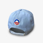 The Official Obama 2008 Campaign Hat in light blue features an embroidered Obama campaign logo above the adjustable strap at the back—a great piece of campaign memorabilia.