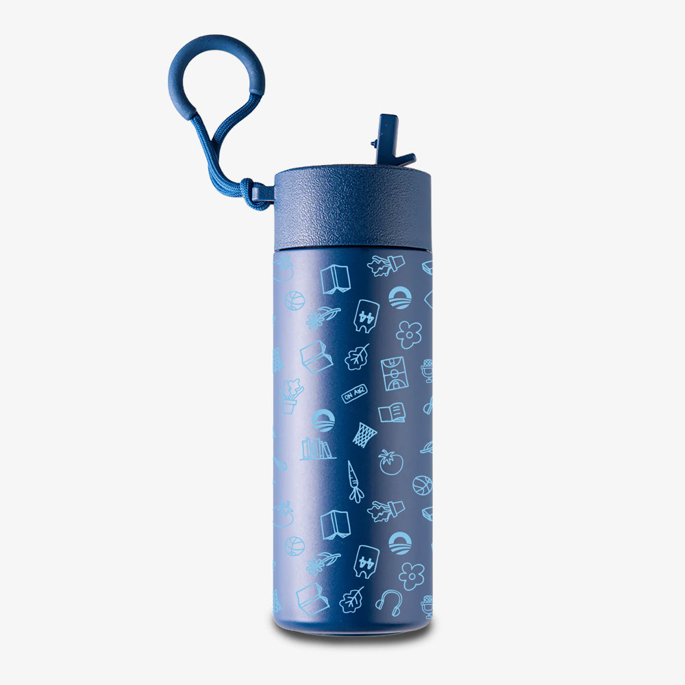 The Obama Presidential Center Hope Water Bottle, Navy, features a flip-top lid, built-in clip, and playful light blue doodles of books, flowers, and sports gear on a plain background.