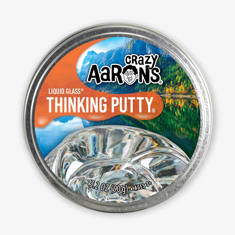 A 3.2 oz round tin of Liquid Glass Putty with crystal-clear putty inside, featuring a mountain lake label design, promotes STEAM learning, and is suitable for ages 3 and up.