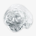 Liquid Glass Putty is a glossy, crystal-clear amorphous blob resembling melted glass or thick gel, shown against a plain white background.