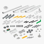 Windpower kit components—including gears, rods, blades, a circuit board, and connectors in gray, white, yellow, and green—are neatly arranged on a white background.