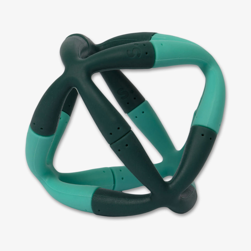 The Evergreen Flex Set features teal and dark green geometric, interconnected rounded tubes, forming an abstract 3D structure—resembling a modern educational creativity set—displayed against a white background.