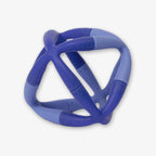 The Bluegrass Flex Set is a blue geometric rubber dog toy with interconnected rounded bars forming an open, spherical shape—ideal as a stress-relief toy for playful pups.