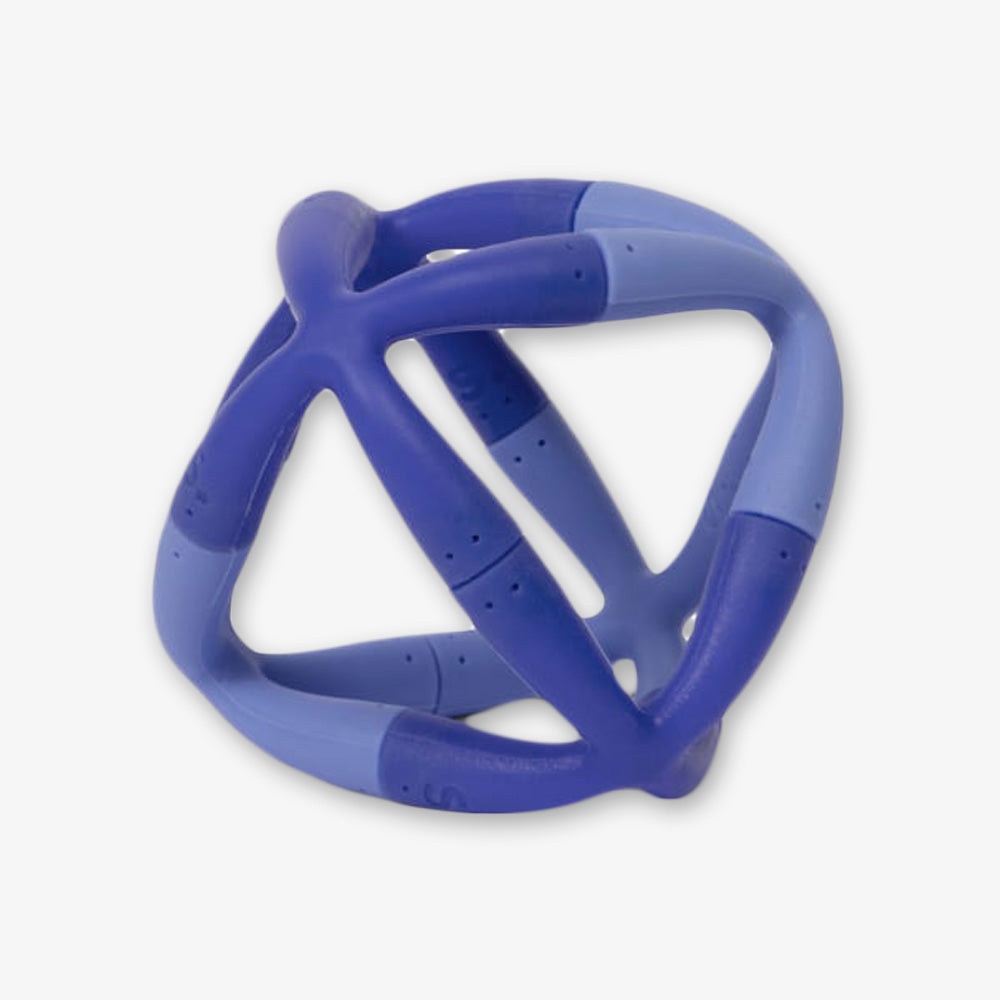 The Bluegrass Flex Set is a blue geometric rubber dog toy with interconnected rounded bars forming an open, spherical shape—ideal as a stress-relief toy for playful pups.