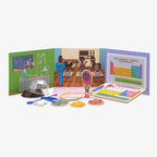 The Chemistry STEAM Kit includes lab tools, colored powders, tablets, a periodic table puzzle, and a classroom backdrop with illustrated students, teacher, and science equipment—perfect for fun DIY crystal making activities.