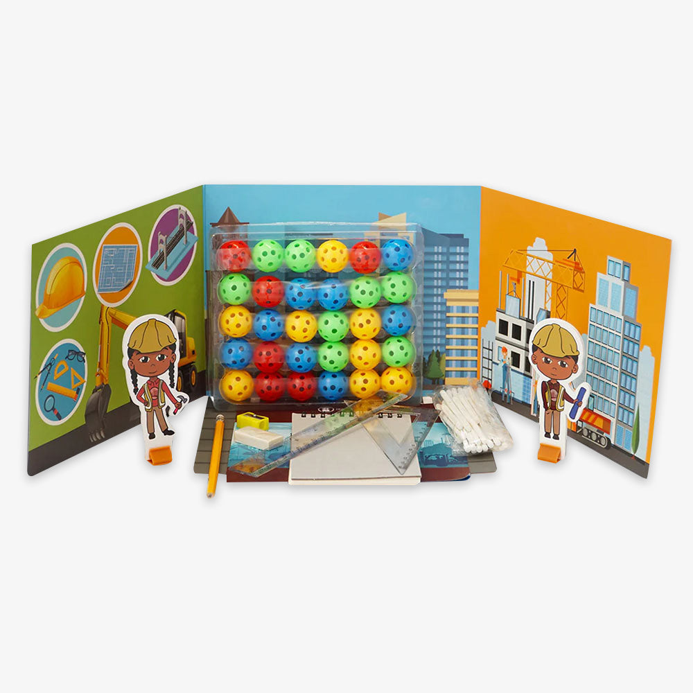 The Architecture and Engineering STEAM Kit, a construction-themed set from a Black-owned toy company, includes colorful plastic balls, sticks, builder cutouts, building illustrations, a ruler, and tools displayed on a white background.