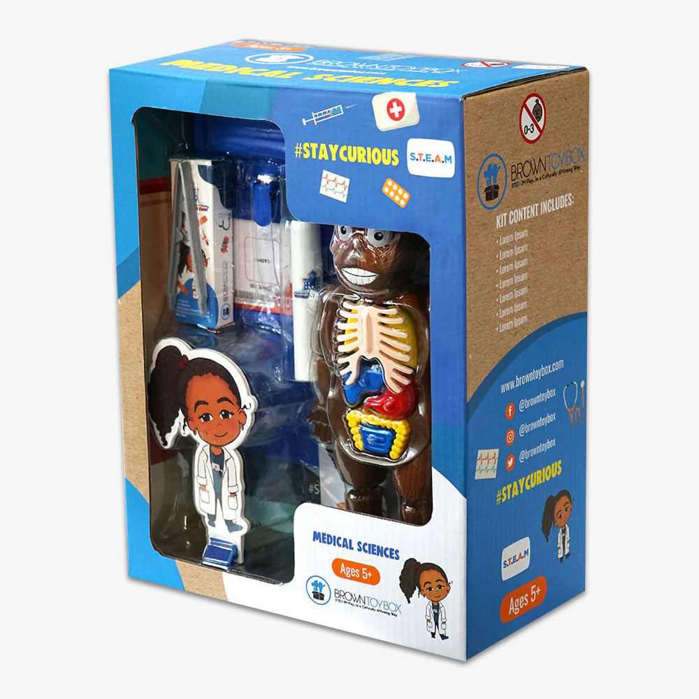 The Medical Sciences STEAM Kit for ages 5+ includes a smiling doctor cartoon, anatomy doll with removable organs, and medical tools in a blue #STAYCURIOUS S.T.E.A.M. by Brown Toy Box package.