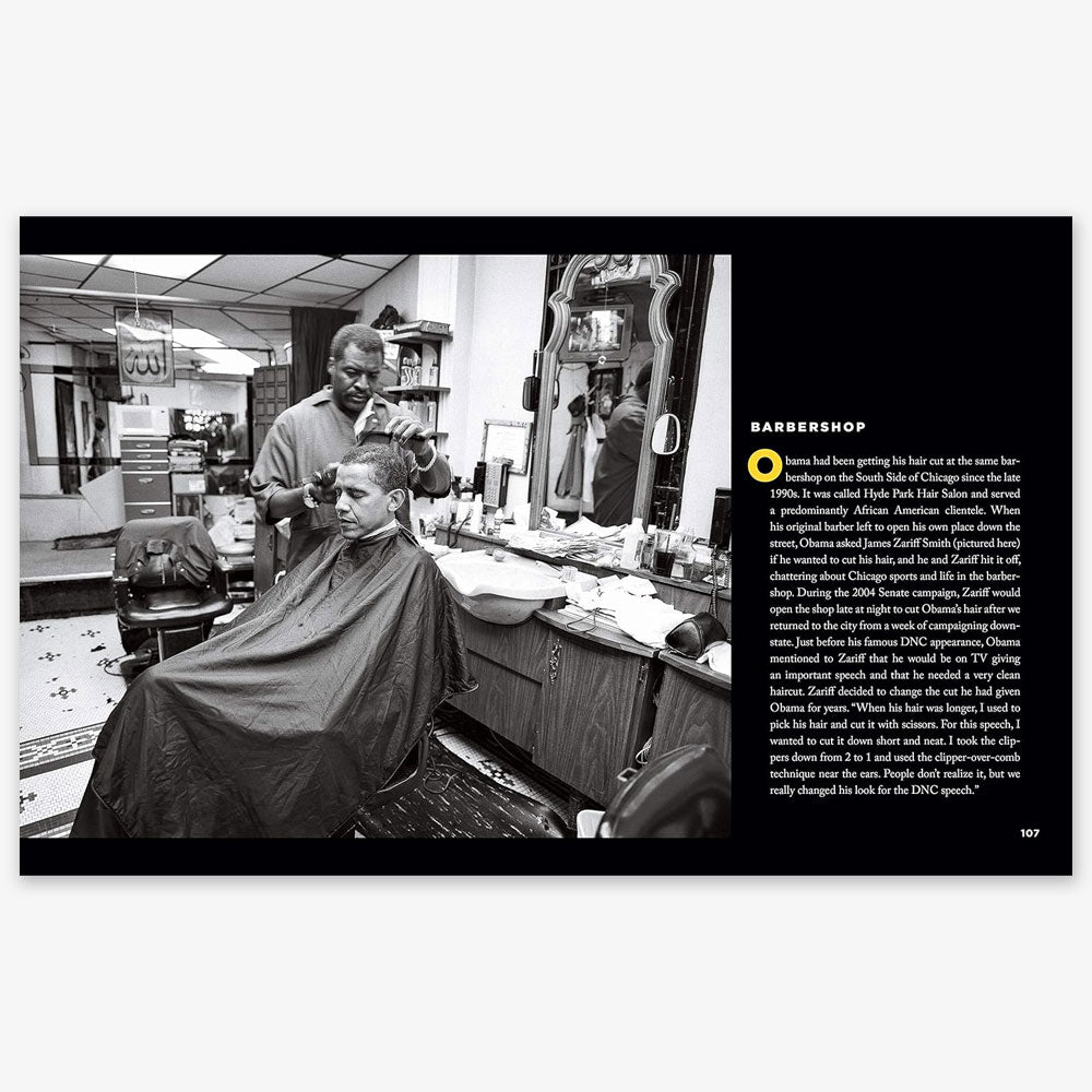 A Black barber trims a man’s hair in a bustling barbershop. Tools, mirror, and cape are seen. On the right, text highlights "Barack Before Obama: Life Before the Presidency." Everyday life is captured in this vibrant photo.