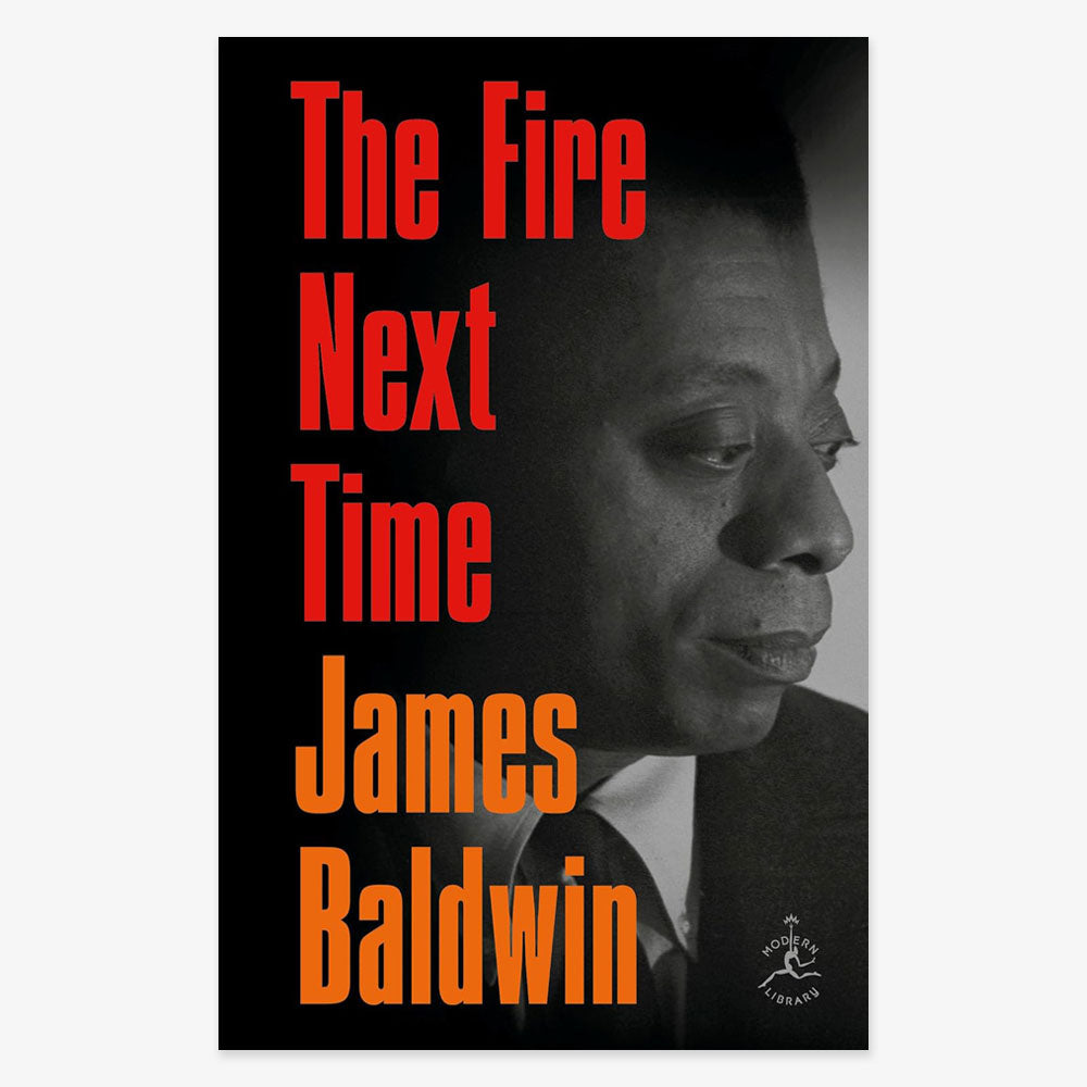 Book cover for The Fire Next Time, with bold red and orange text over a black-and-white portrait of a man in a suit gazing to the right, evoking themes of American racism.