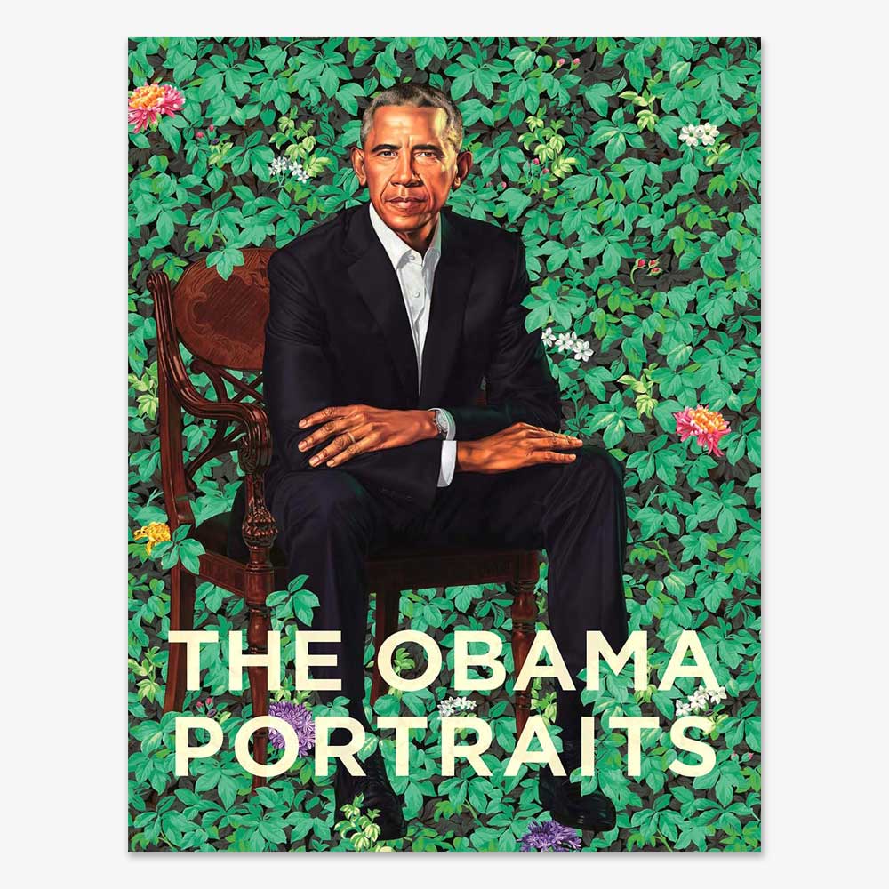 The Obama Portraits features Barack Obama, painted by Kehinde Wiley, seated on a wooden chair surrounded by lush greenery and flowers, with “THE OBAMA PORTRAITS” text below to mark his inclusion in the National Portrait Gallery.