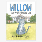 The cover of "Willow the White House Cat" shows Willow, a gray tabby, on grass in front of the White House. This illustrated children’s book is by Jill Biden with art by Kate Berube.