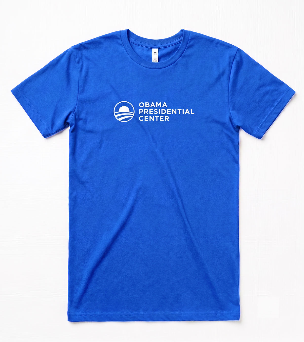 The Obama Presidential Center Logo T-Shirt - Royal Blue features the center’s logo and white text on the chest, celebrating the Obama Foundation’s lasting impact on Chicago’s South Side.
