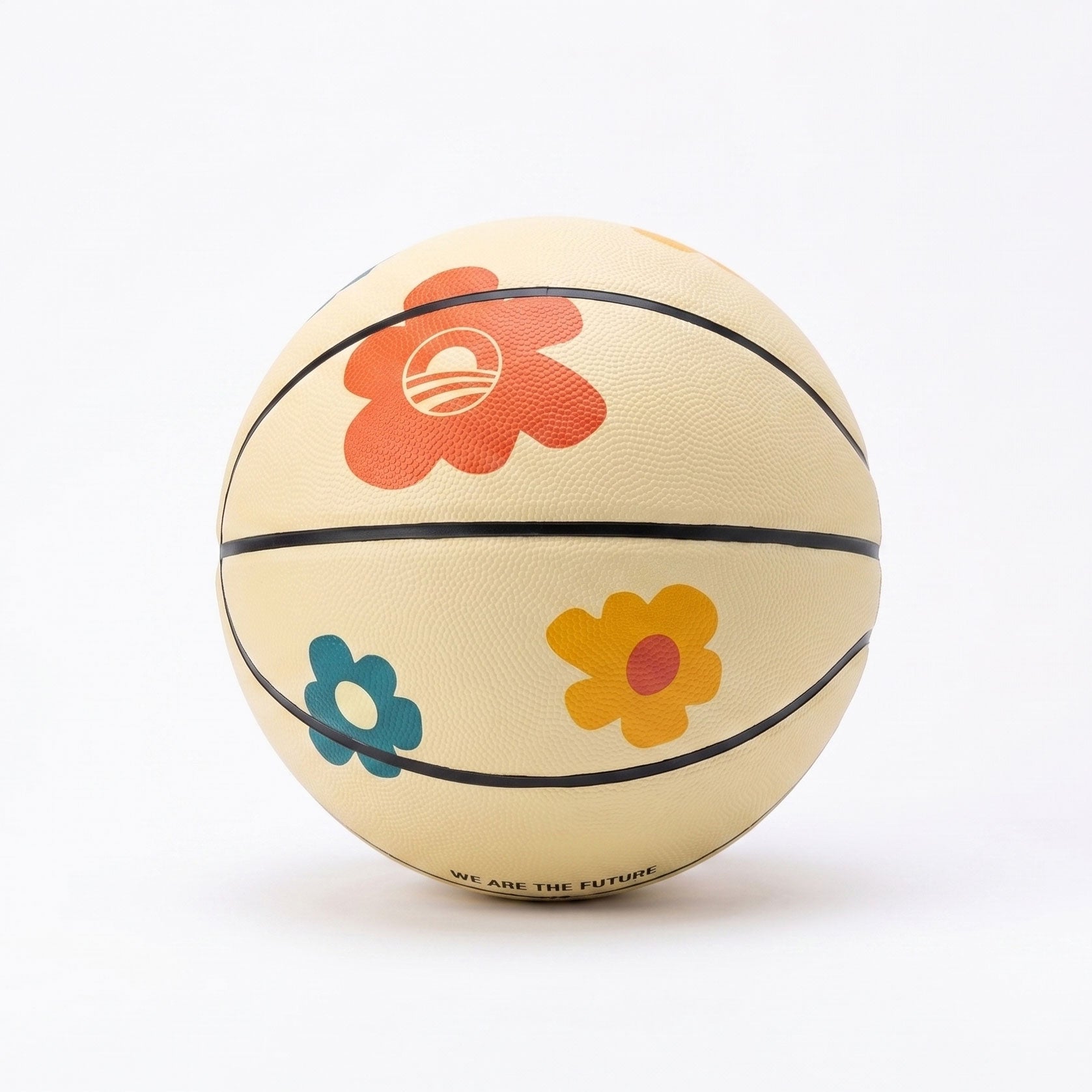 The Obama Presidential Center Floral Basketball features a cream base with red, orange, yellow, and blue flower designs and "We Are The Future" along the bottom edge. Part of the Home Court collection, it is photographed on a white background.