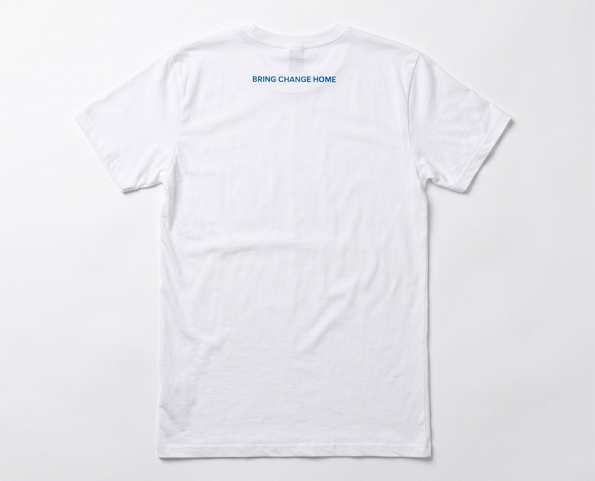 The Obama Presidential Center Symbol T-Shirt in white is shown from the back, featuring "BRING CHANGE HOME" printed in small blue letters near the neck.