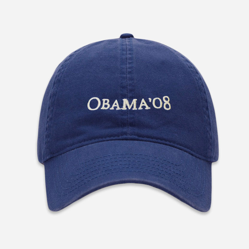 The Official Obama 2008 Campaign Hat - Blue features white embroidered "OBAMA 08" text on the front, making it perfect for fans and collectors of campaign memorabilia.