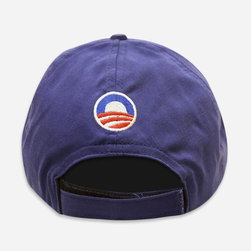The Official Obama 2008 Campaign Hat – Blue, seen from the back with the campaign logo embroidered above its adjustable strap, is a perfect piece of memorabilia for any supporter.