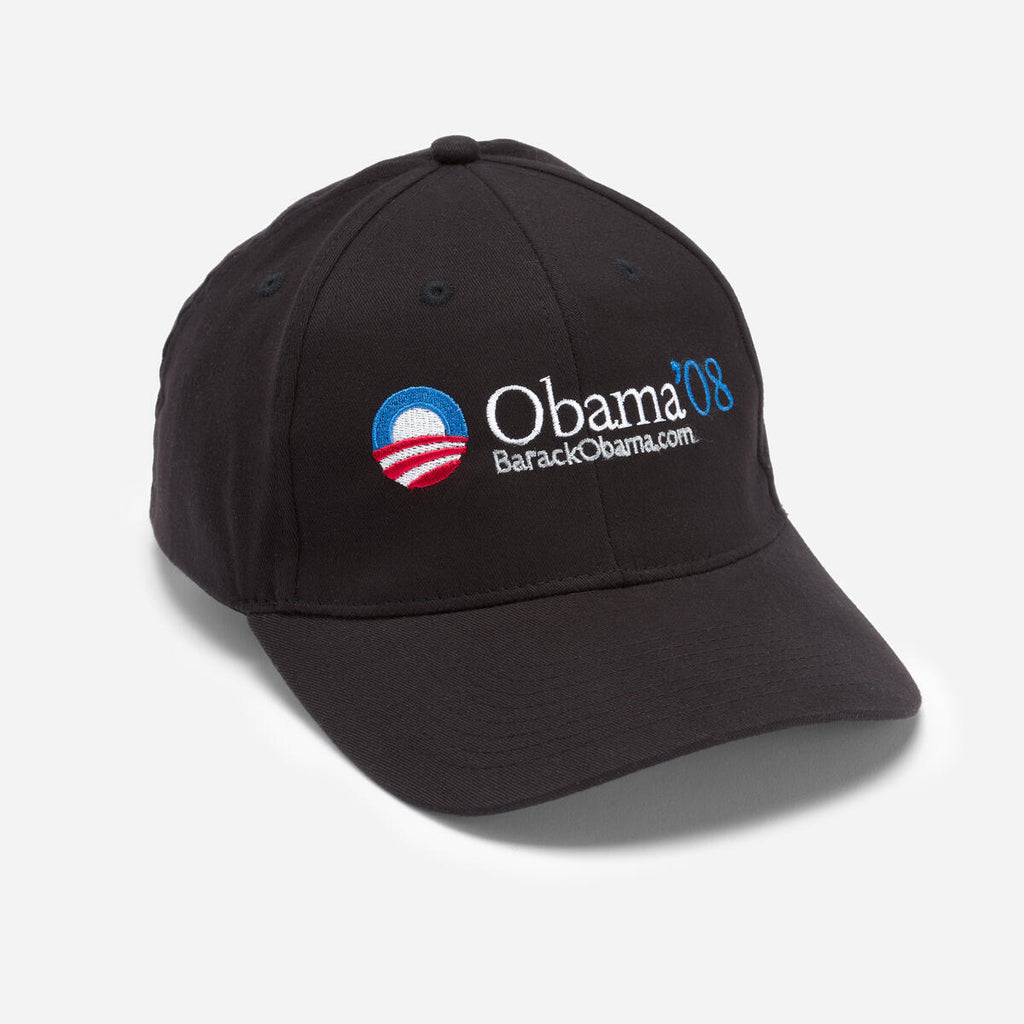 The Official Obama 2008 Campaign Hat - Black features "Obama 08," "BarackObama.com," and a blue and red logo on the front—ideal campaign memorabilia.