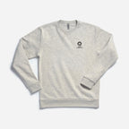 The Obama Foundation Sweatshirt is a light gray, long-sleeve crewneck with a small black logo and text on the left chest, shown laid flat on a white background.